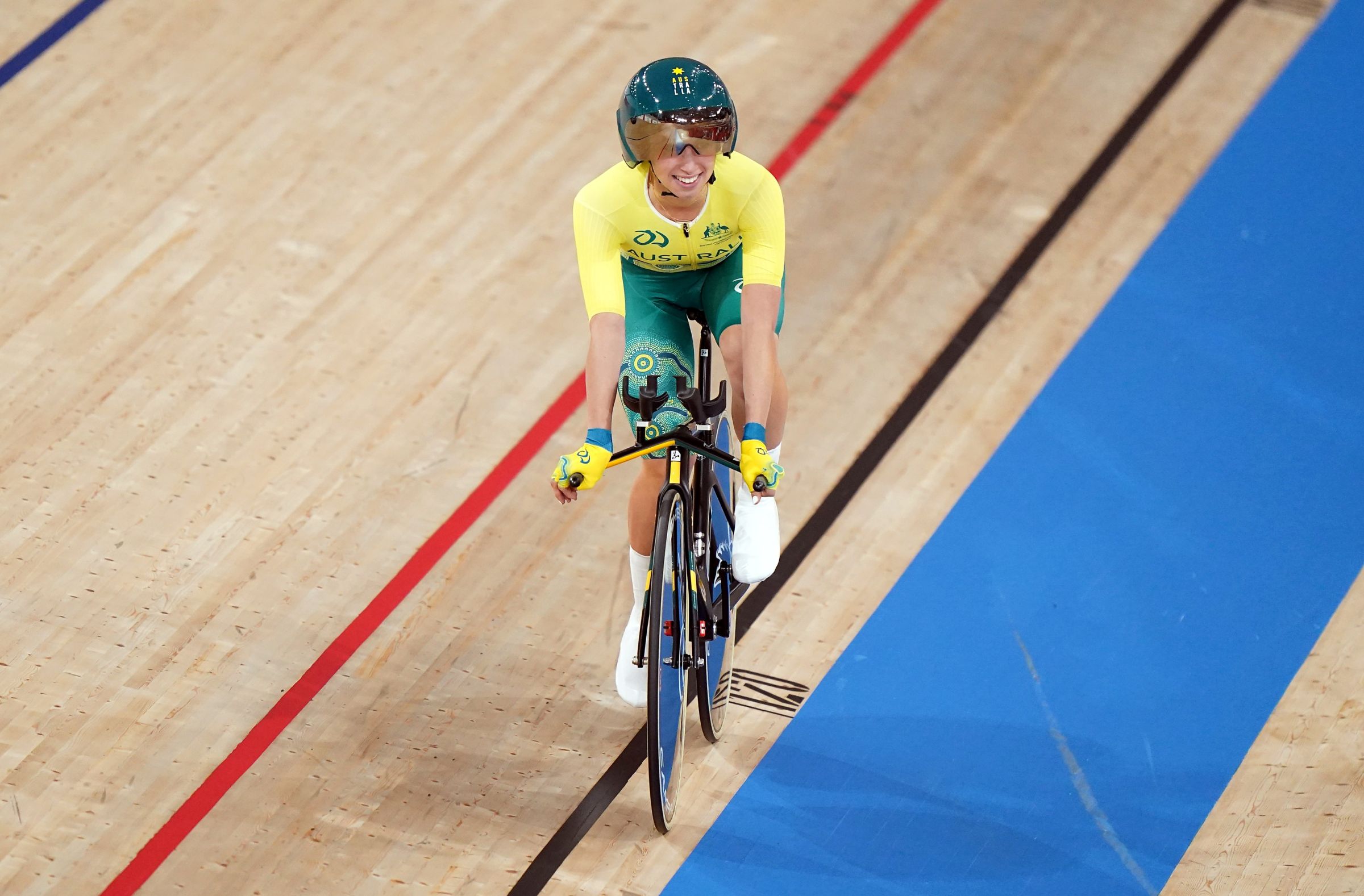 Paige Greco on the track of the velodrome after winning a gold medal at the 2020 Tokyo Paralympic Games